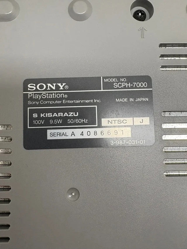 Consola PS1 con Caja y Corchos JAP