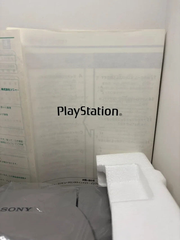 Consola PS1 con Caja y Corchos JAP