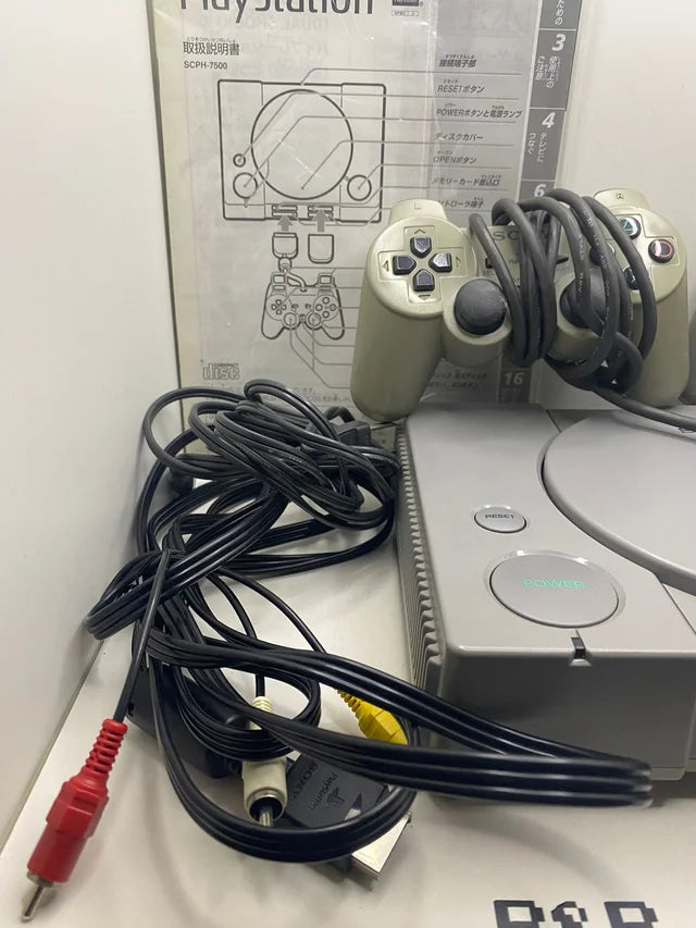 Consola PS1 con Caja y Corchos