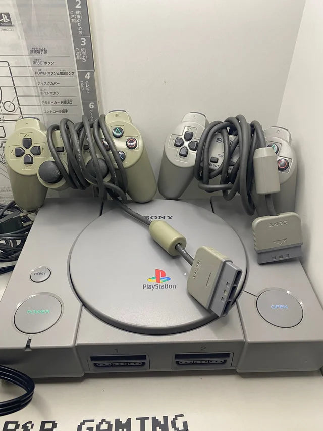 Consola PS1 con Caja y Corchos