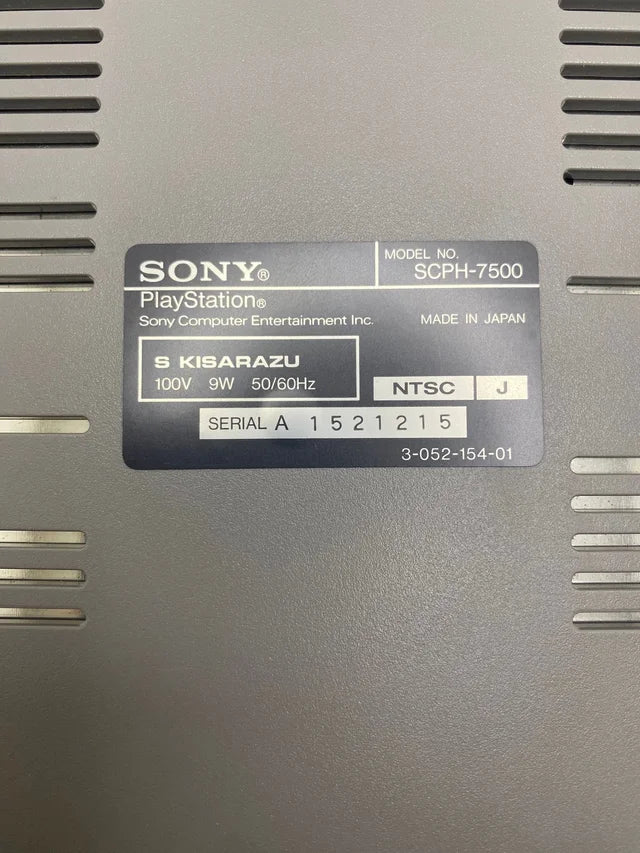 Consola PS1 con Caja y Corchos