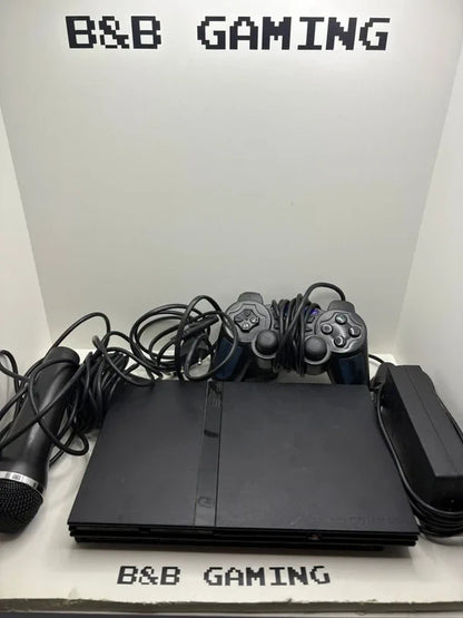 Consola PlayStation 2 + 14 videojuegos y 9 demos.