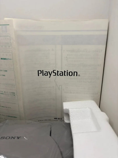 Consola PS1 con Caja y Corchos JAP